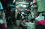 tina trying on clothes in hoi an